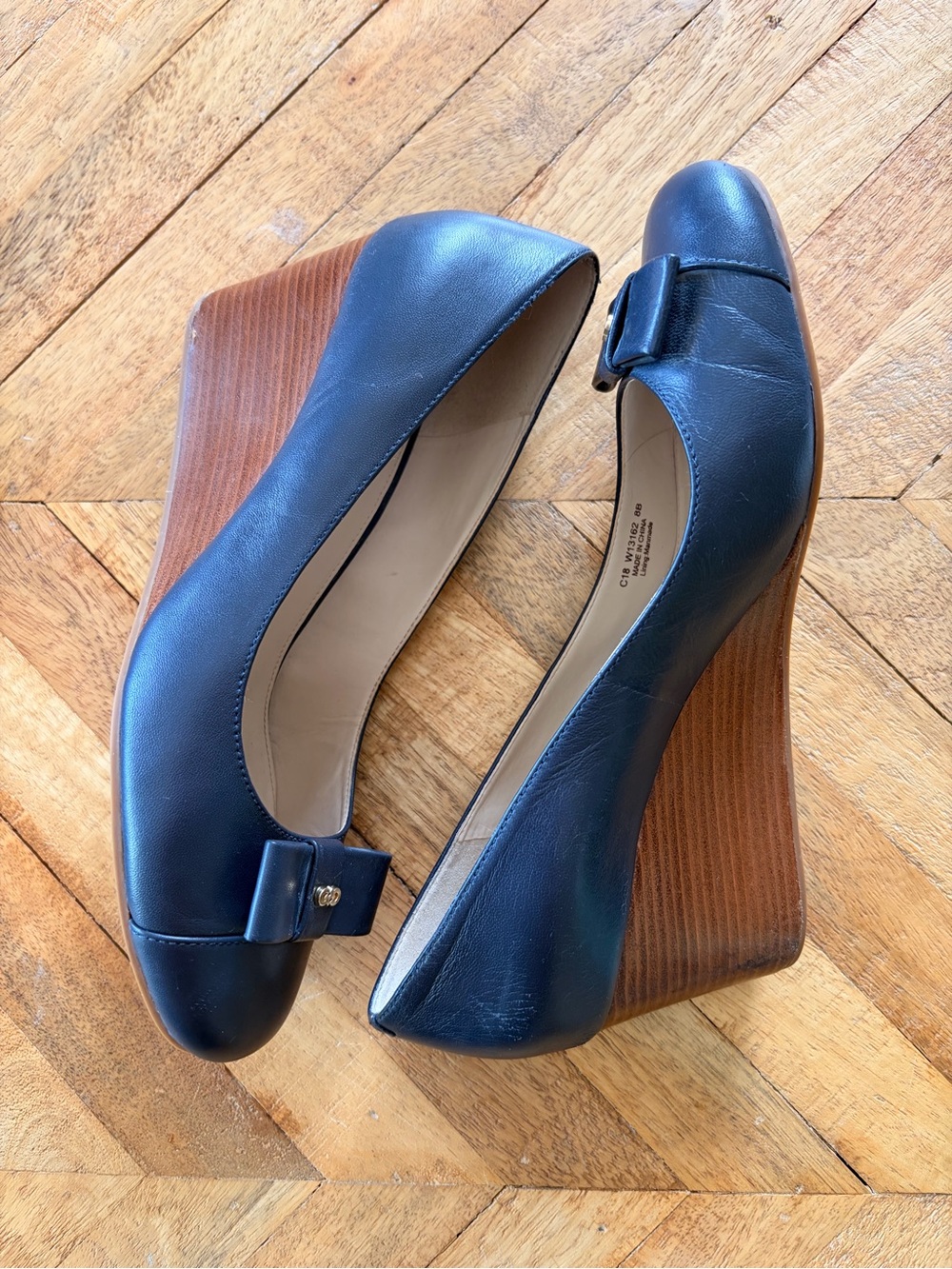 Cole Haan Navy Leather Bow Toe Pumps with Gold Accent - Picture 2 of 5